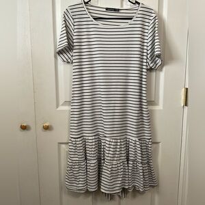 Boohoo black and white stripped dress. Size 14. Ruffled skirt.